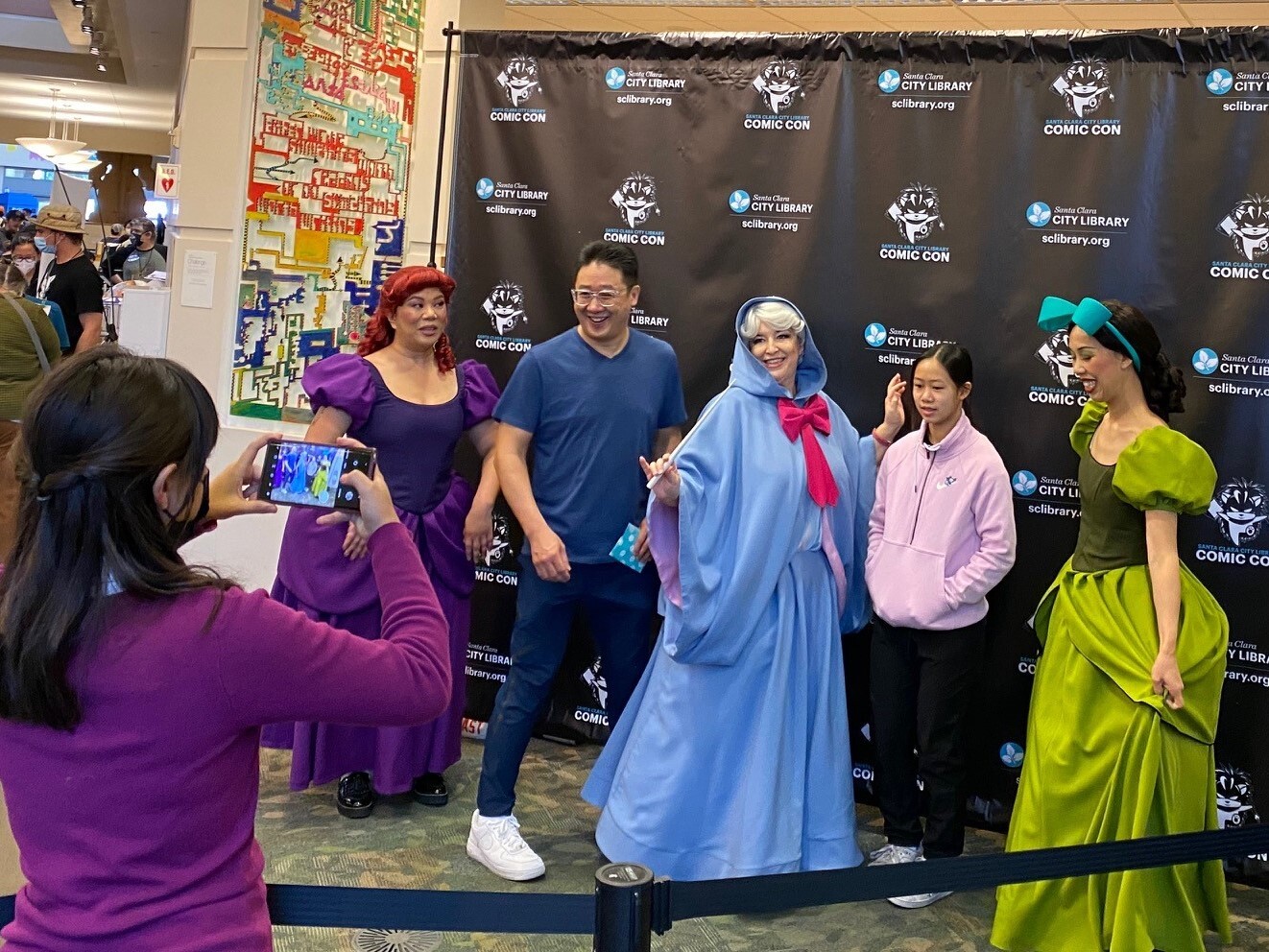 Princesses taking at photo at Santa Clara City Library Comic Con 2022