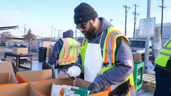 A person working at the Household Hazardous Waste Dropoff