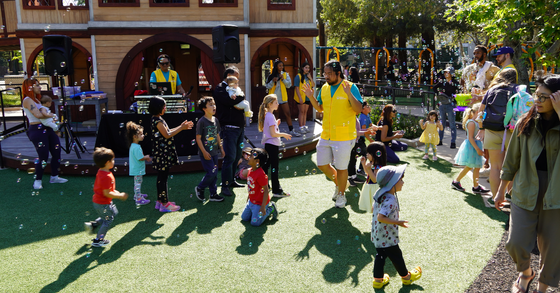 Kids dancing at the Magical Bridge Playground