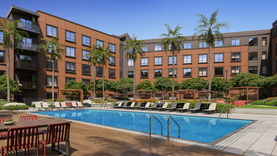 Orlo Apartments showing building and pool