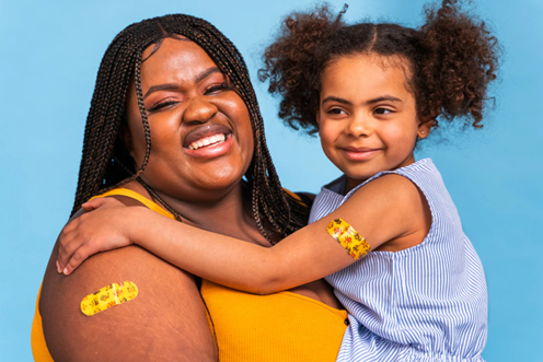 women and child smiling 