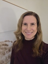 Headshot of a woman, Gina.