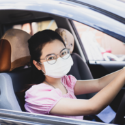 Person in Mask Driving