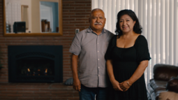 Couple in front of new gas fireplace