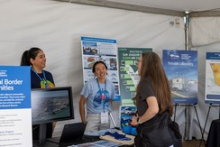 District staff talking with a Valley resident