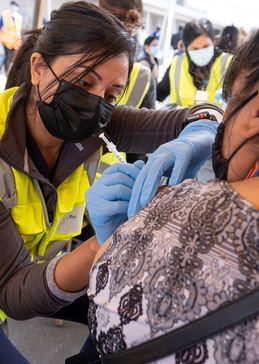 person getting vaccine