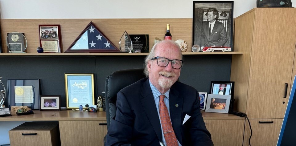 Supervisor Warren Slocum sitting at his desk