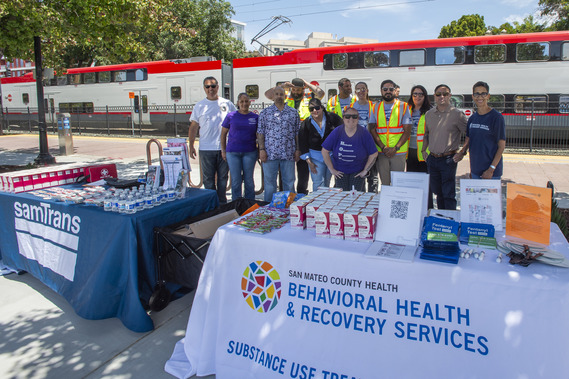 volunteers at SamTrans naloxone distribution event