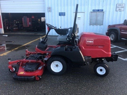 Image of red and black mower