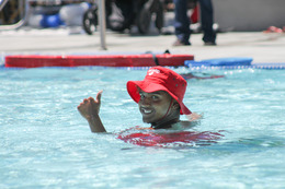 Lifeguard smiling in the pool 