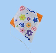 paper kite on blue background