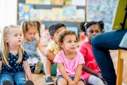 sensory storytime, children sitting on the floor in a classroom