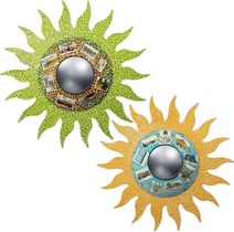 Two sun-shaped mosaic sculptures with central mirrors.