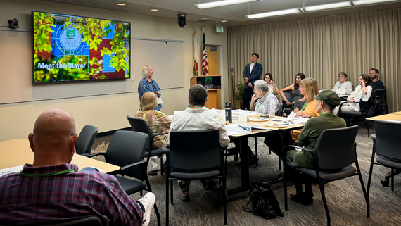 A class of participants listen to a speaker (Civic Academy)