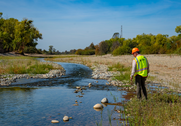 Jeff Mathews inspects habitat at Hallwood