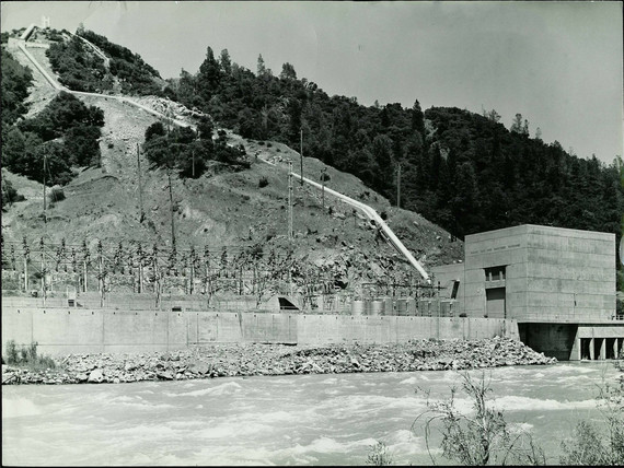 A black and white photo of Colgate Powerhouse and its associated equipment located along the Yuba River. 