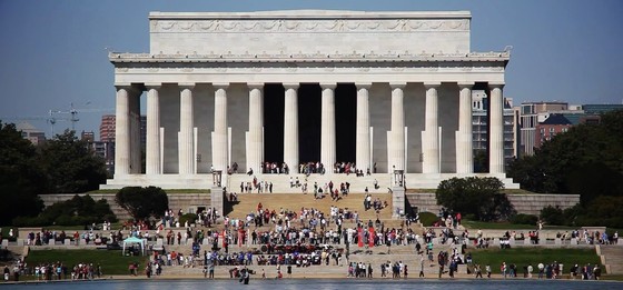 people assembled at steps of Lincoln Memorial