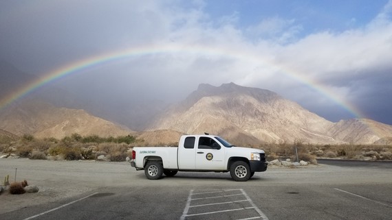 Anza-Borrego Desert SP (Rainbow arch over Indianhead with Parks car)