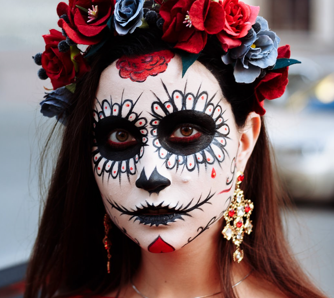 Woman dressed in Dia de los Muertos makeup