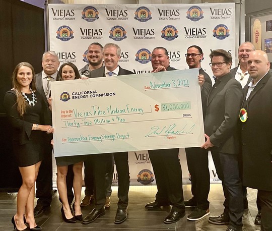Chair Hochschild, Viejas Tribal officials and Indian Energy representatives holding a check for $31 million for an innovative energy storage project.