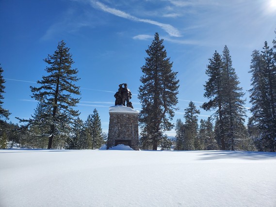 Donner Memorial SP monument with snow on March 2, 2023