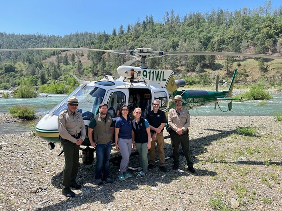 Auburn SRA_staff in front of Falcon 30 helicopter