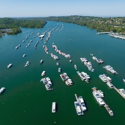 An aerial view shows high water conditions at  Lake Oroville with houseboats docked at the marina. 