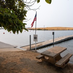 A boarding dock and picnic bench at the Monument Hill Boat Ramp at the Thermalito Afterbay in Oroville. 