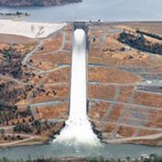 An aerial view shows water releases from Oroville Dam's main spillway in June 2023. 
