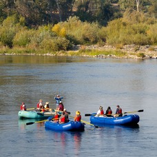Public members participate in a floating classroom tour hosted by DWR scientists on the Feather River. 