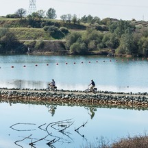 Two people ride ride along the Brad Freeman Bike Trail in Oroville. 