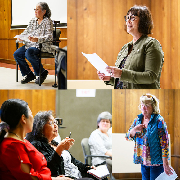 Women reading from scripts, and one speaking from the audience, at a historical society event