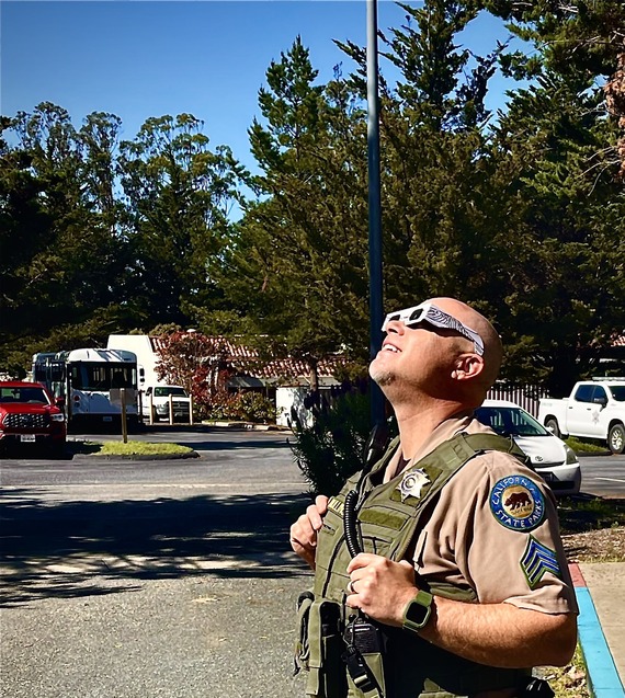 SPPO Robb Mullins looking up at the eclipse