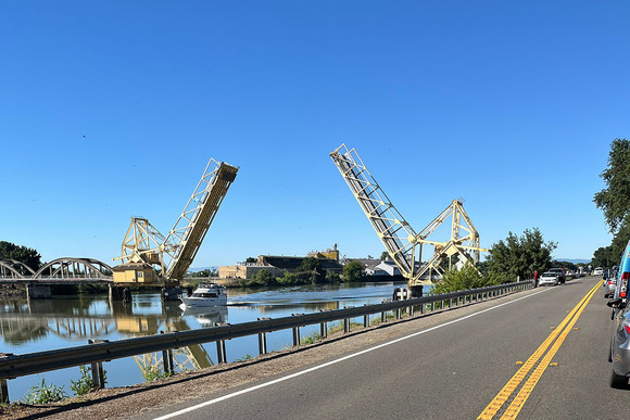 Traffic waits for a boat to pass under the Isleton Bridge in May 2024