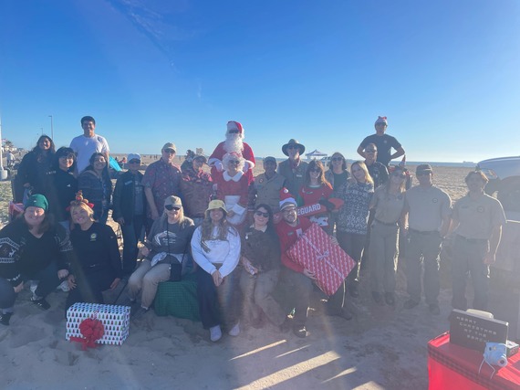Bolsa Chica SB_Santa and Mrs. Claus with staff and volunteers