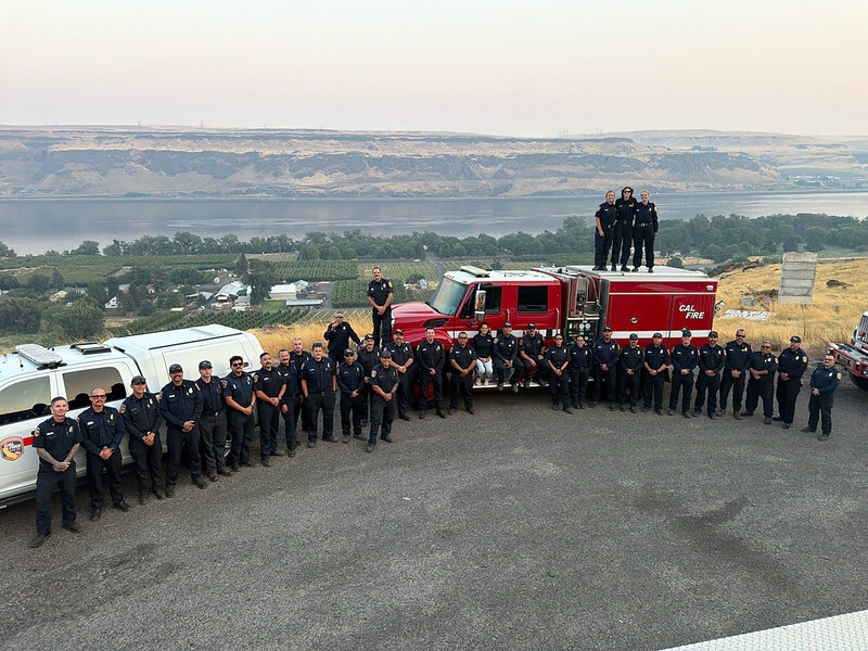 Group of firefighters with Washington horizon in background.
