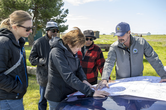 People studying a map