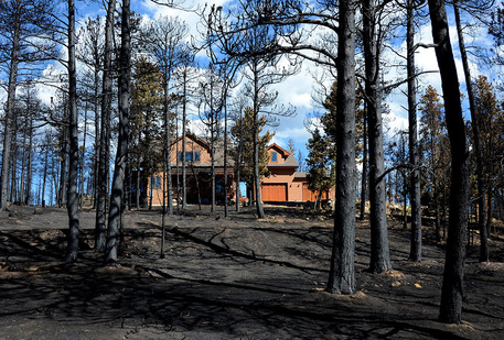 2607 Ridge Road northeast of Nederland, Colorado, survived the Cold Springs Fire