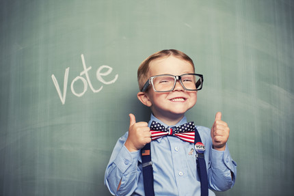 Kid supporting voting