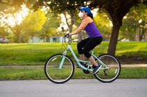 Woman Biking with Mask 