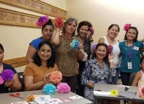 group of women showing art crafts