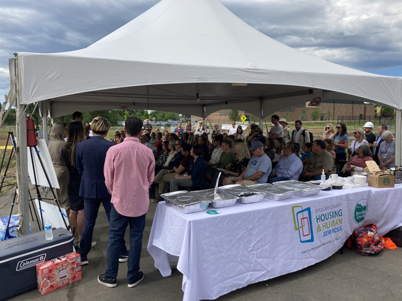 Large tent full of affordable housing supporters at Willoughby Corner groundbreaking