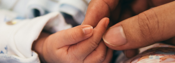 Mom holding newborn baby