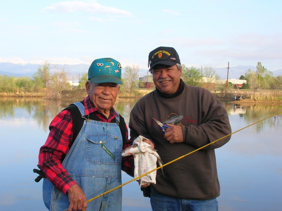 two seniors prepare their fishing tack