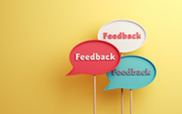 Dialogue bubbles on a stick that read feedback