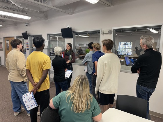 Clerk speaking to tour attendees