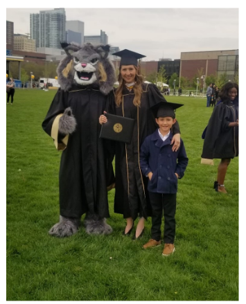 Jackie Cordova in graduation gown, holding a degree