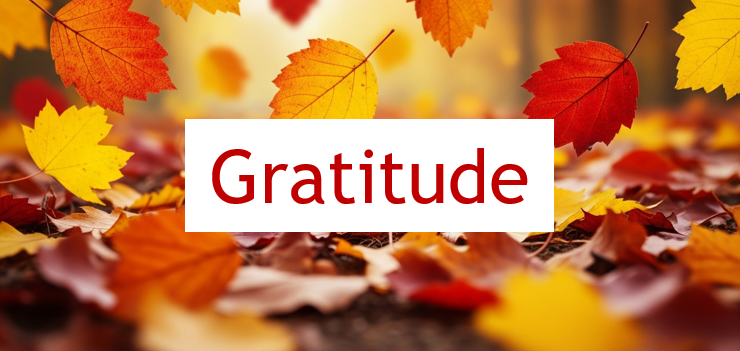 Gratitude against a background of gold, orange and brown autumn leaves