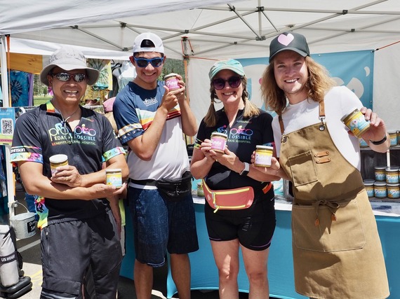 People holding nut butter at the Dillon Farmers Market