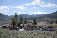 People gather at a cemetery for a Memorial Day Remembrance Ceremony 